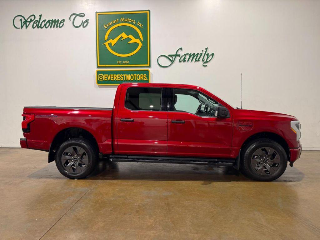 used 2023 Ford F-150 Lightning car, priced at $41,990