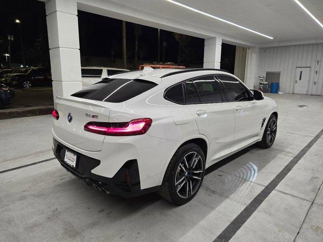 used 2023 BMW X4 M car, priced at $54,997