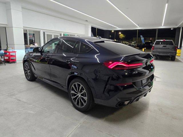 used 2026 BMW X6 car, priced at $77,076