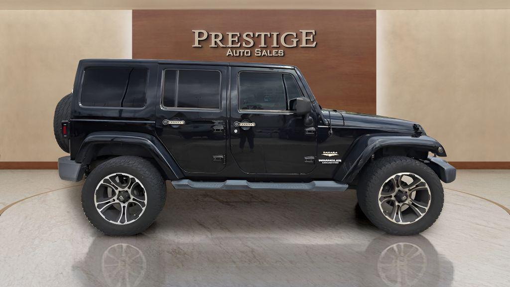 used 2013 Jeep Wrangler Unlimited car, priced at $17,077