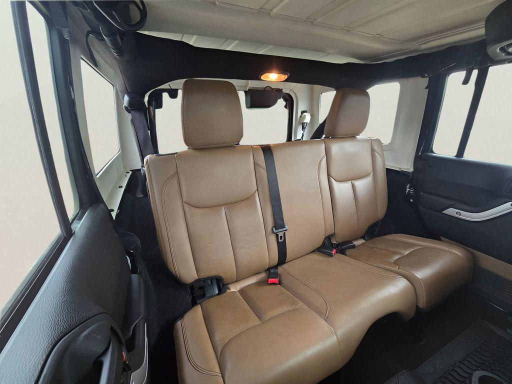 used 2013 Jeep Wrangler Unlimited car, priced at $16,757