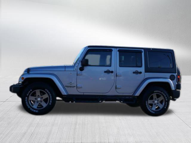 used 2013 Jeep Wrangler Unlimited car, priced at $13,900