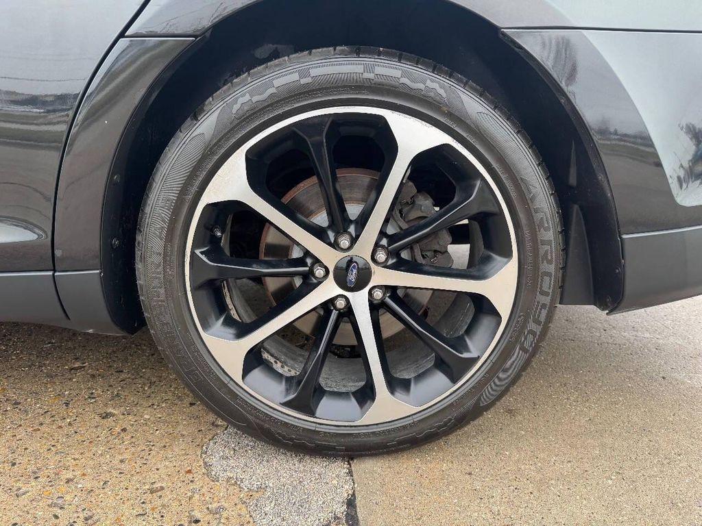 used 2015 Ford Taurus car, priced at $13,900