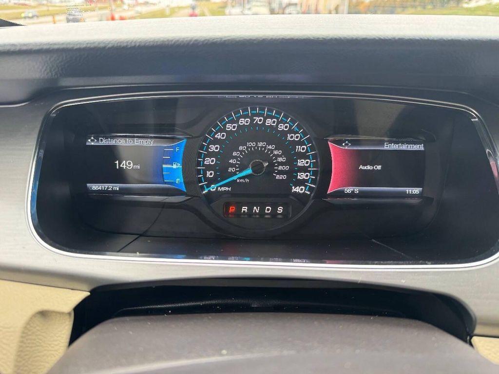 used 2015 Ford Taurus car, priced at $13,900