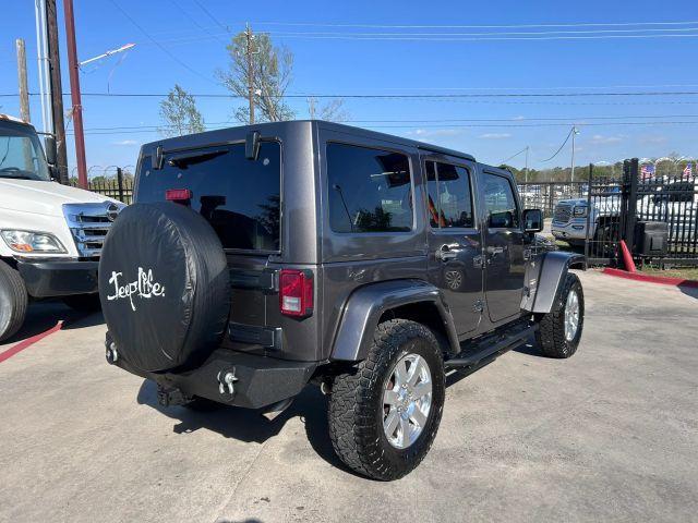 used 2014 Jeep Wrangler Unlimited car, priced at $15,499