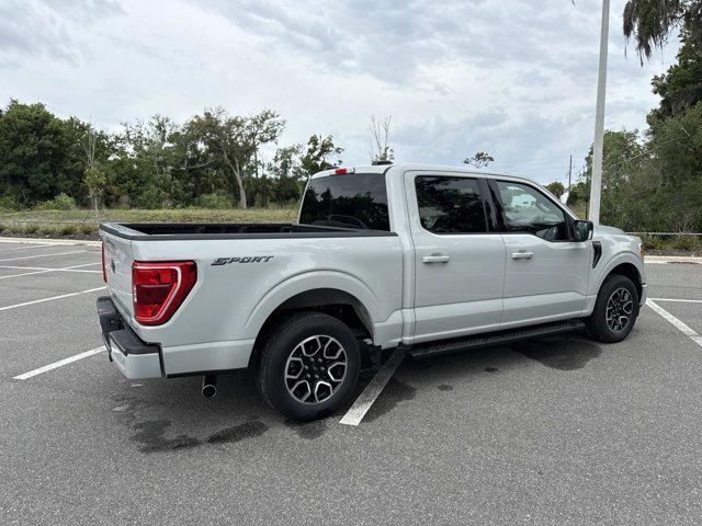 used 2023 Ford F-150 car, priced at $32,090
