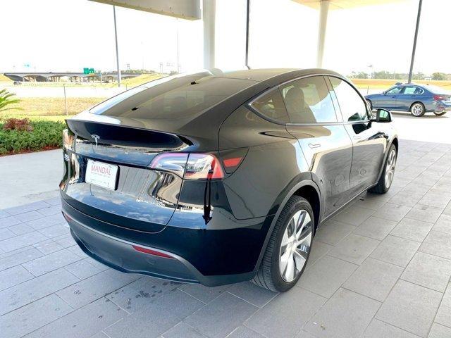 used 2023 Tesla Model Y car, priced at $34,200