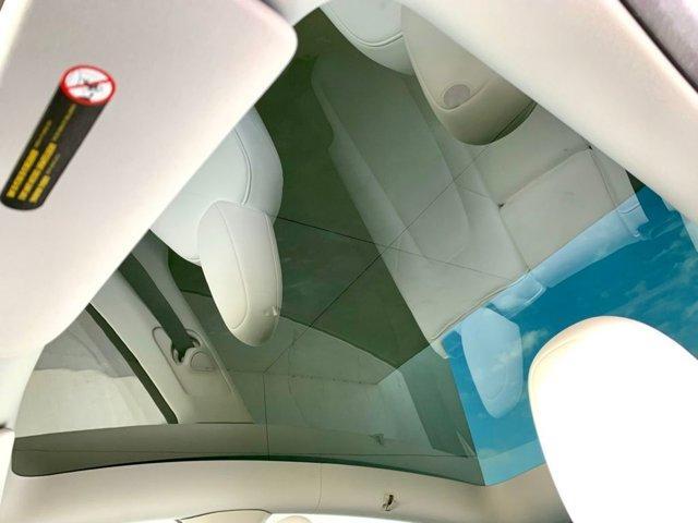 used 2023 Tesla Model Y car, priced at $34,200