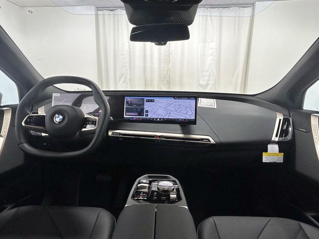 new 2026 BMW iX car, priced at $82,045