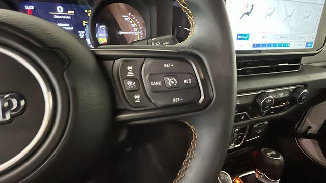 used 2024 Jeep Wrangler 4xe car, priced at $24,348
