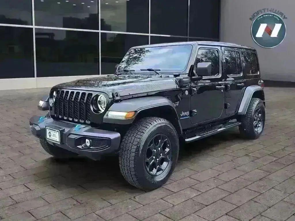 used 2023 Jeep Wrangler 4xe car, priced at $27,597