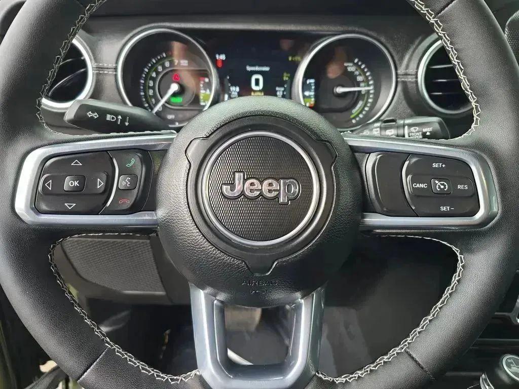 used 2023 Jeep Wrangler 4xe car, priced at $31,597