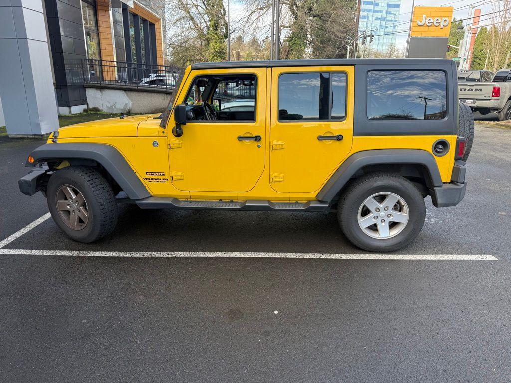 used 2015 Jeep Wrangler Unlimited car, priced at $16,990