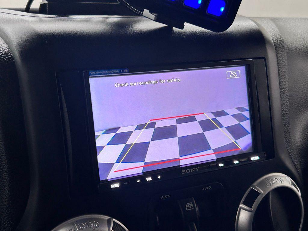 used 2012 Jeep Wrangler Unlimited car, priced at $16,988