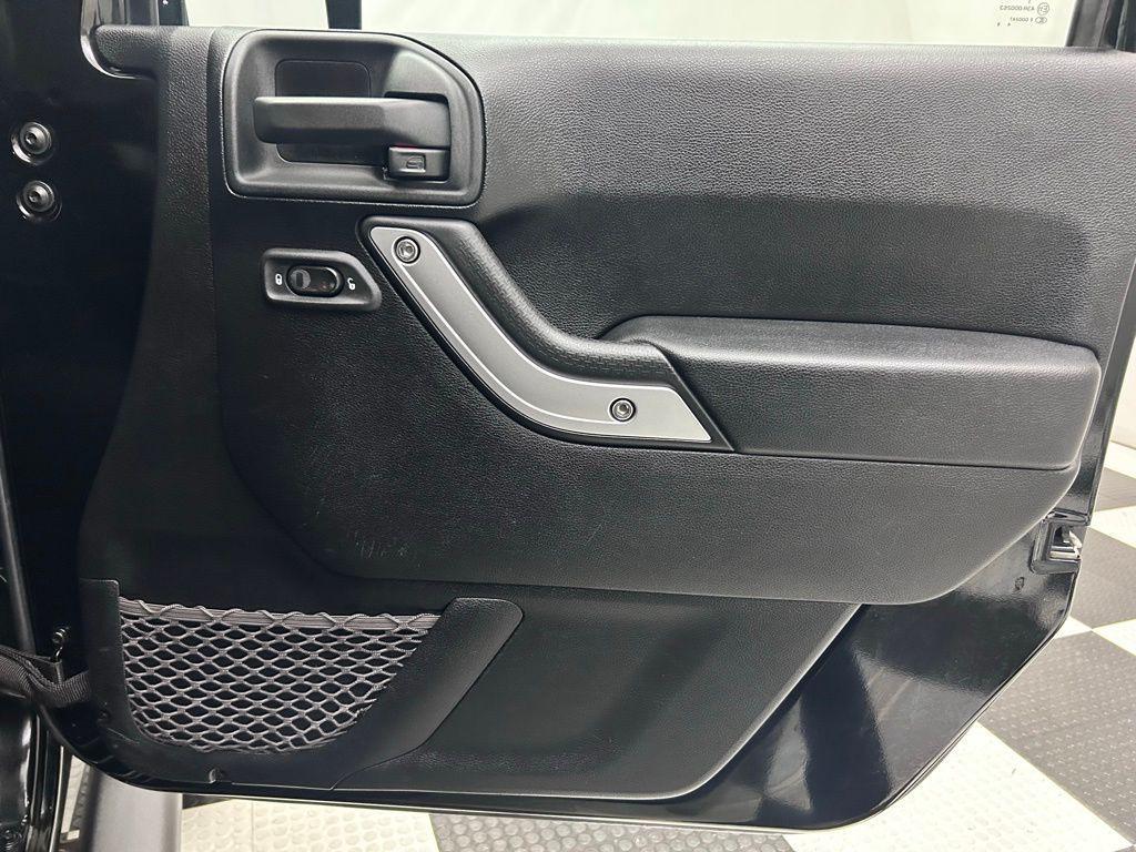 used 2012 Jeep Wrangler Unlimited car, priced at $16,988