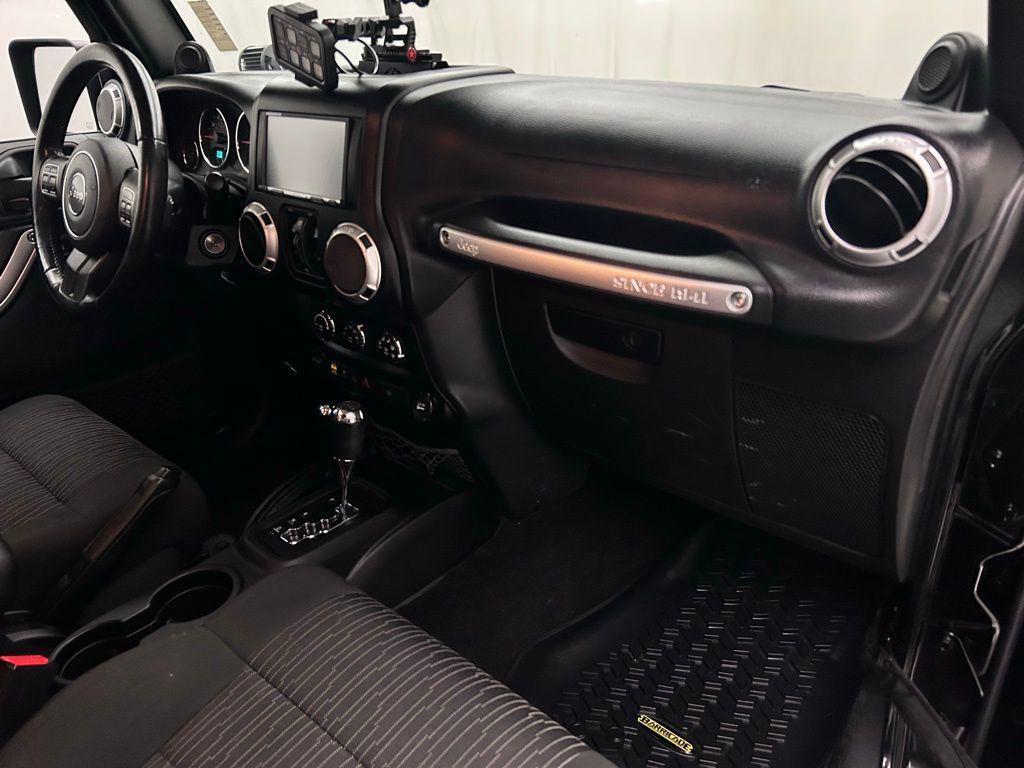 used 2012 Jeep Wrangler Unlimited car, priced at $16,988