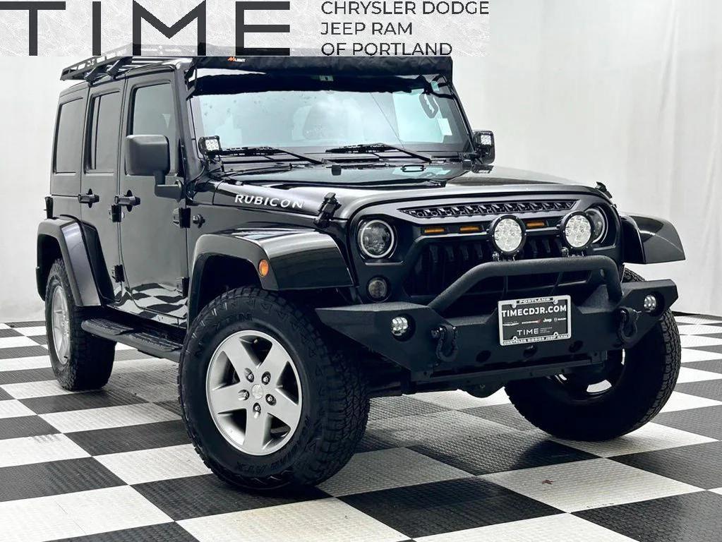used 2012 Jeep Wrangler Unlimited car, priced at $16,988