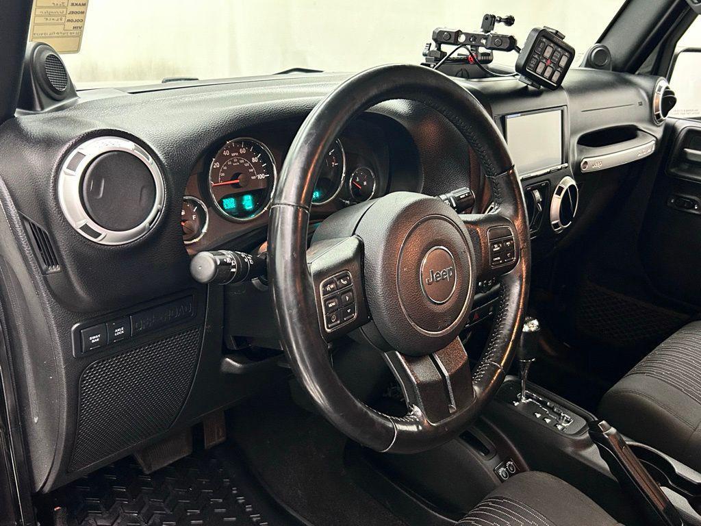used 2012 Jeep Wrangler Unlimited car, priced at $16,988