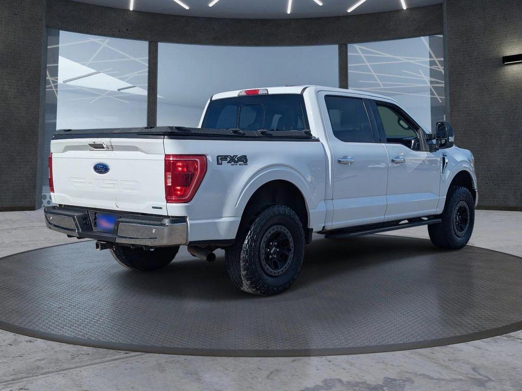 used 2021 Ford F-150 car, priced at $25,696