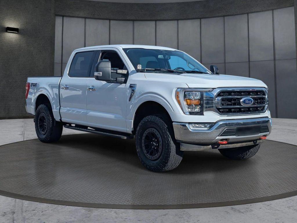 used 2021 Ford F-150 car, priced at $25,696