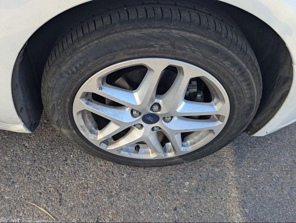 used 2016 Ford Fusion car, priced at $5,989