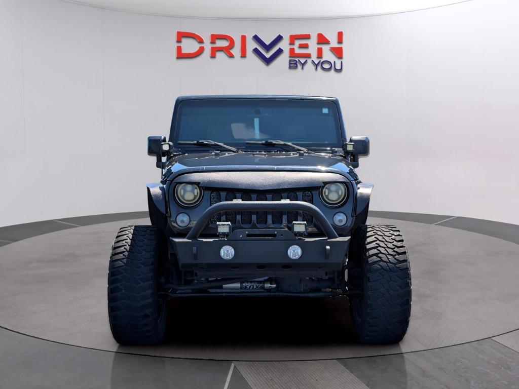 used 2015 Jeep Wrangler Unlimited car, priced at $16,376