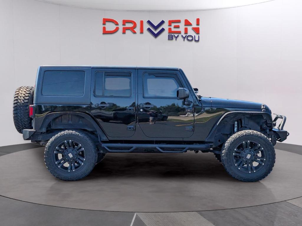 used 2015 Jeep Wrangler Unlimited car, priced at $16,376