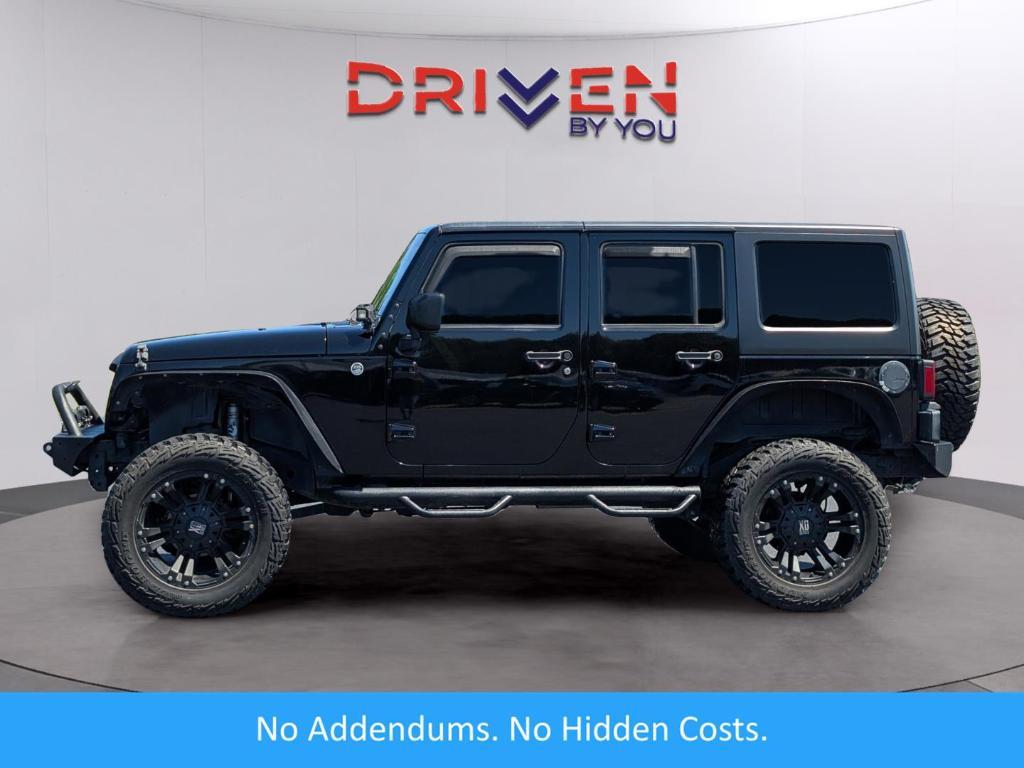 used 2015 Jeep Wrangler Unlimited car, priced at $16,376