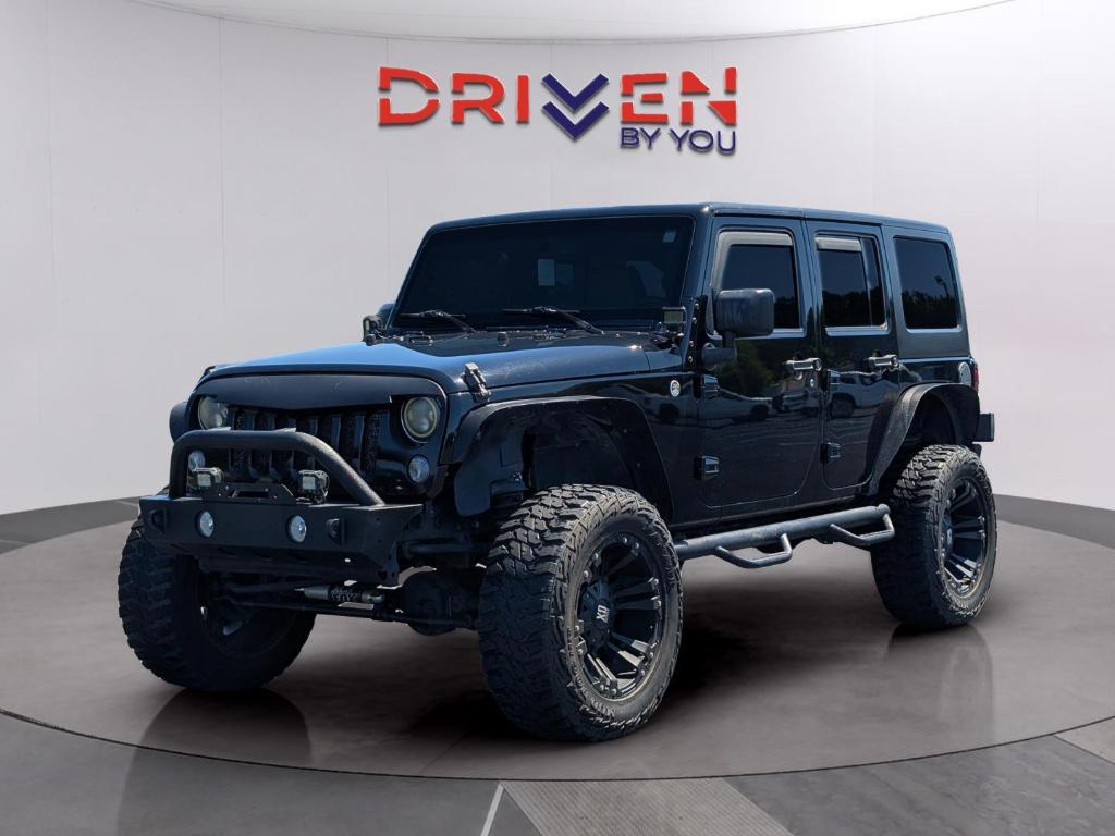 used 2015 Jeep Wrangler Unlimited car, priced at $16,376