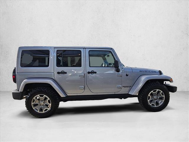 used 2015 Jeep Wrangler Unlimited car, priced at $19,496