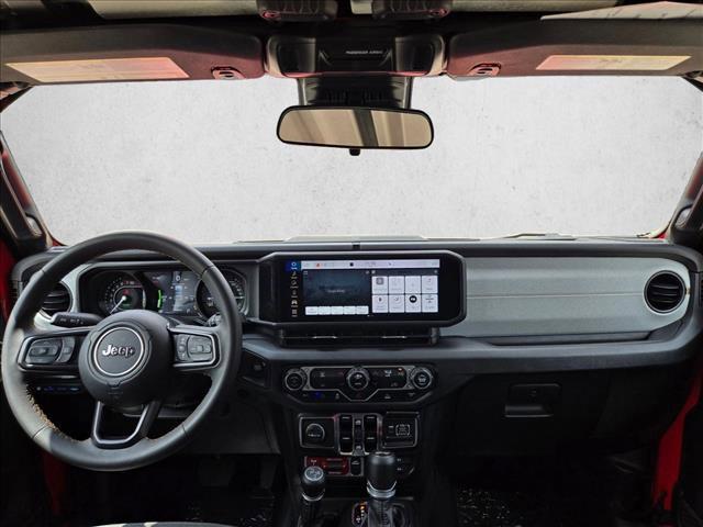 used 2024 Jeep Wrangler 4xe car, priced at $31,216