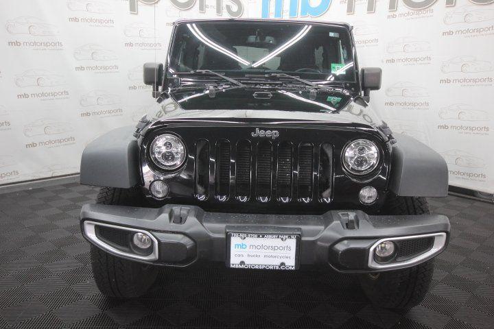 used 2014 Jeep Wrangler Unlimited car, priced at $17,495