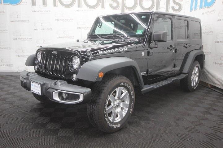 used 2014 Jeep Wrangler Unlimited car, priced at $17,495