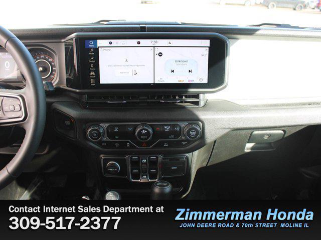 used 2024 Jeep Wrangler car, priced at $30,992