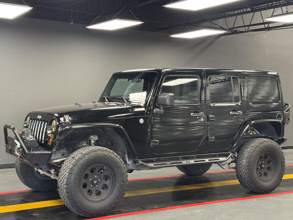 used 2011 Jeep Wrangler Unlimited car, priced at $11,999