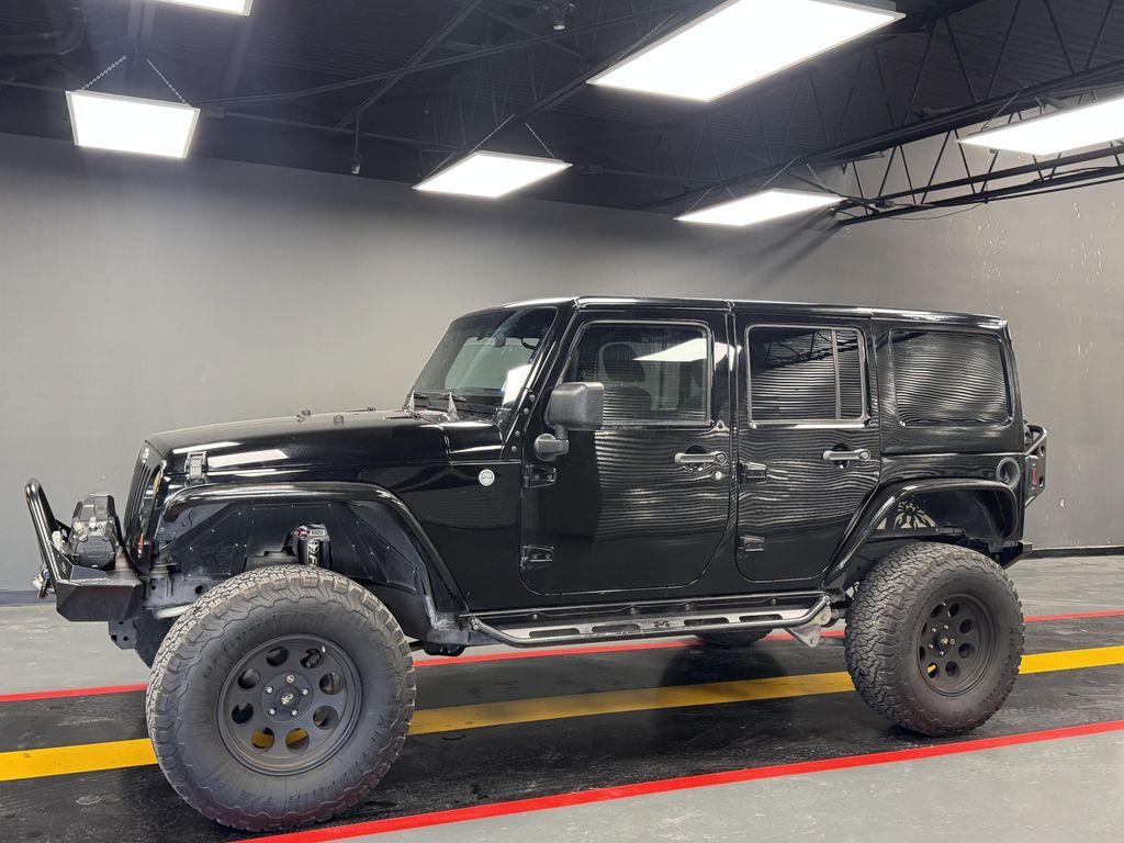 used 2011 Jeep Wrangler Unlimited car, priced at $11,999