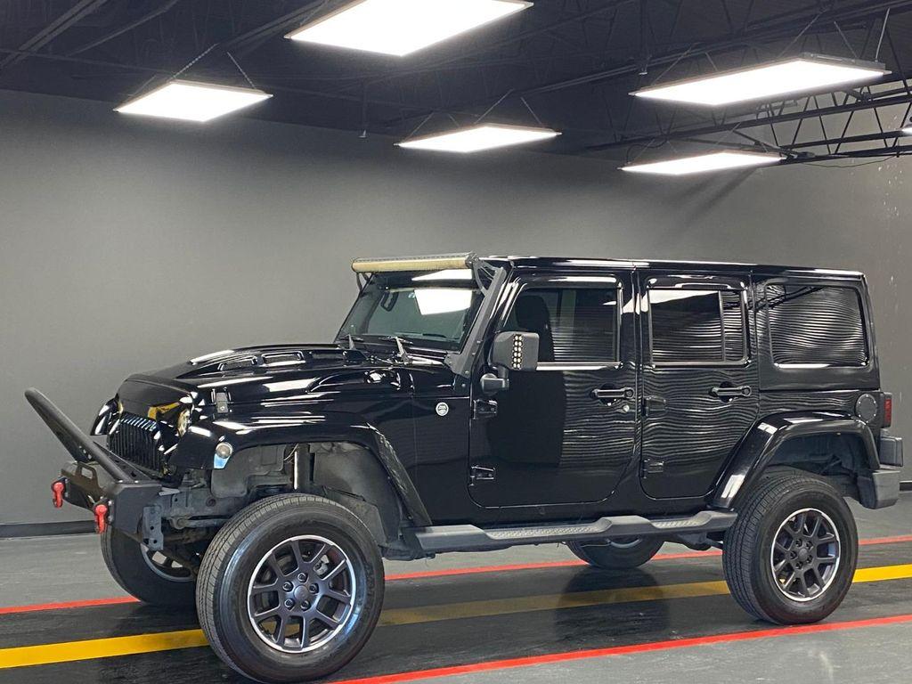 used 2011 Jeep Wrangler Unlimited car, priced at $13,850