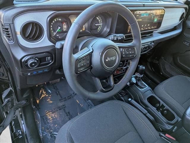 used 2024 Jeep Wrangler 4xe car, priced at $30,253