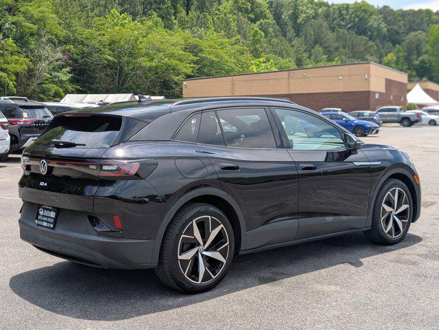 used 2023 Volkswagen ID.4 car, priced at $27,294