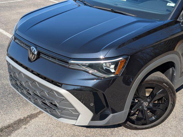 used 2025 Volkswagen Taos car, priced at $21,998
