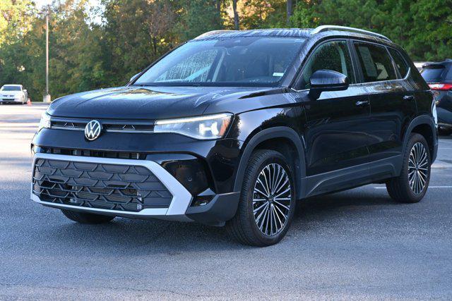 used 2025 Volkswagen Taos car, priced at $22,995