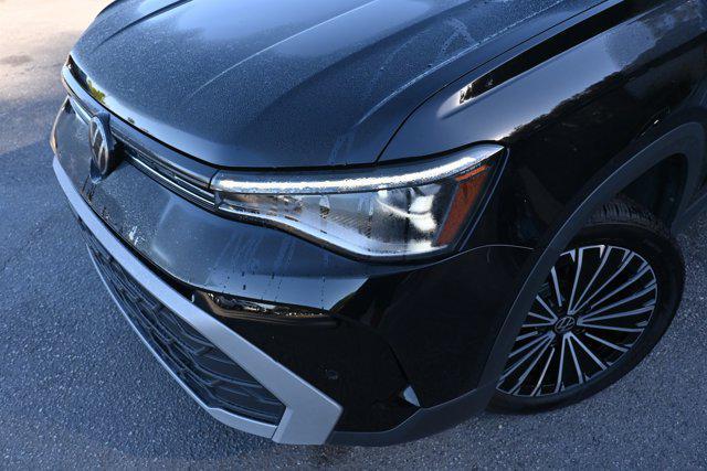 used 2025 Volkswagen Taos car, priced at $22,995