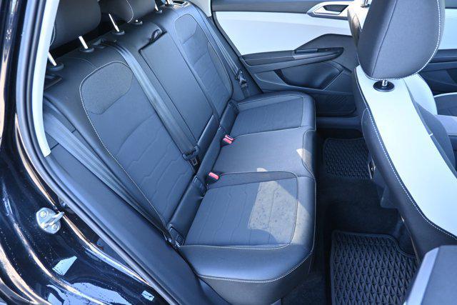 used 2025 Volkswagen Taos car, priced at $22,995