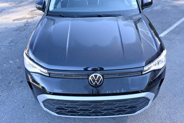 used 2025 Volkswagen Taos car, priced at $22,995