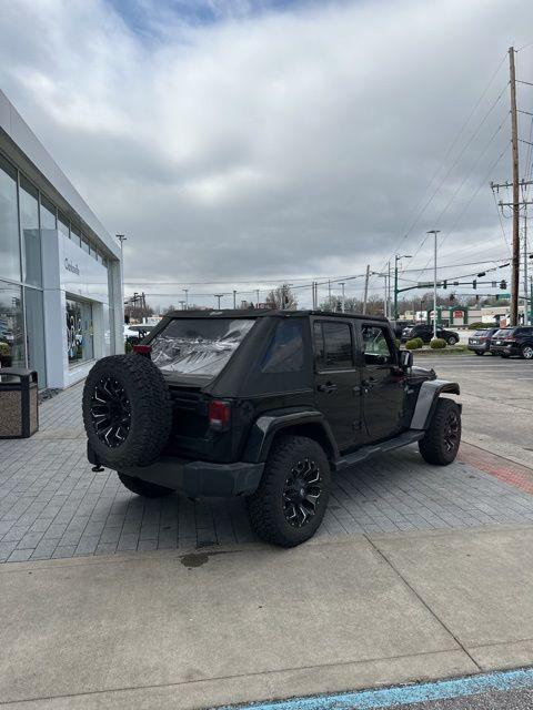 used 2017 Jeep Wrangler Unlimited car, priced at $19,401