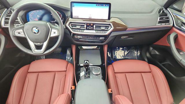 used 2025 BMW X4 car, priced at $47,750