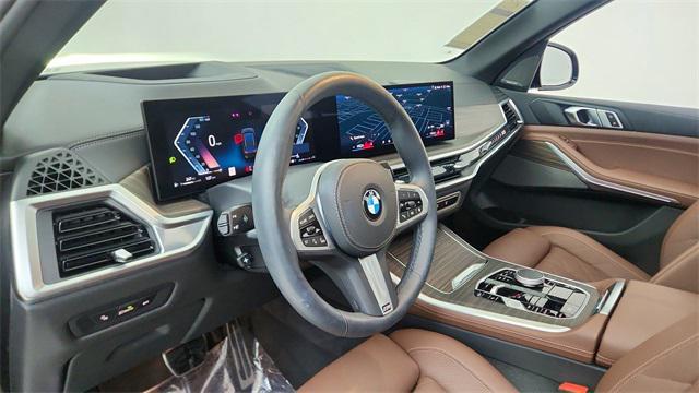 used 2026 BMW X5 car, priced at $68,450