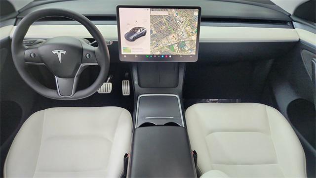 used 2024 Tesla Model Y car, priced at $38,850