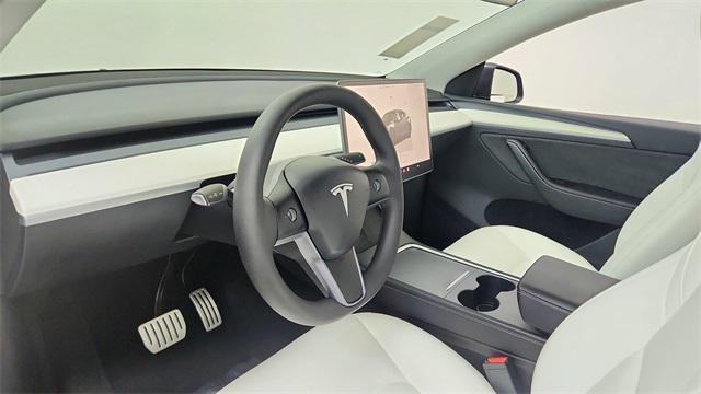 used 2024 Tesla Model Y car, priced at $38,850