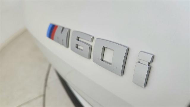 used 2025 BMW X6 car, priced at $82,450